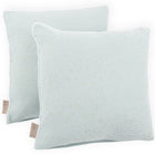 Zwei grüne quadratische KraftKids Kissenbezüge aus Musselin mit kleinen goldenen Punkten und beigen Seitenanhängern, abgebildet auf weißem Hintergrund. Ideal, um jedes Bettwäscheset aufzuwerten.